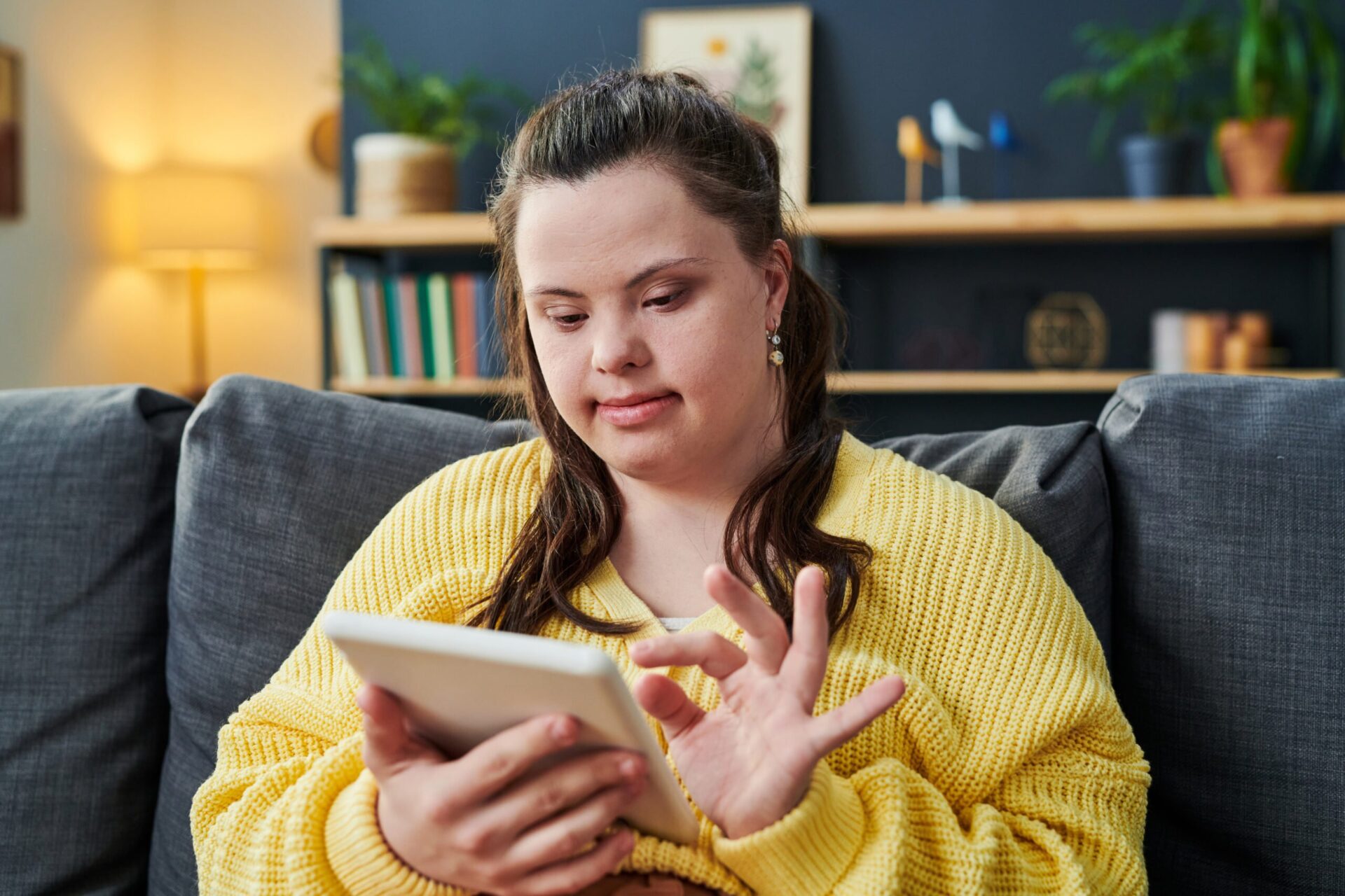 Woman with disability using tablet